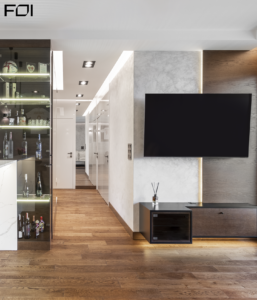 elegancka strefa dzienna z kuchnią w luksusowym apartamencie